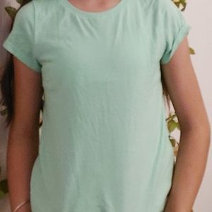 A green tee-shirt